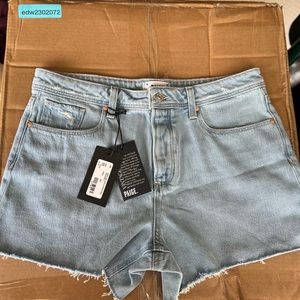 Cut off distressed denim shorts size 29